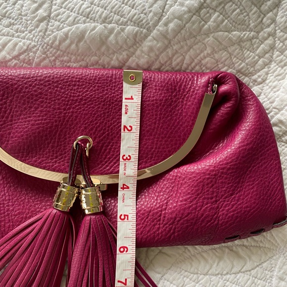 Tumi pink leather clutch w/purple lining and tassels - Picture 2 of 7